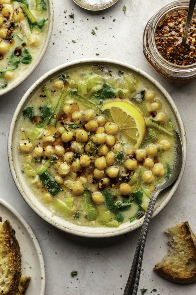 Dairy-free chickpea stew served for dinner with a side of toasted bread