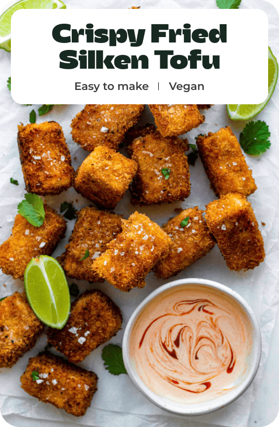 A photo of fried tofu with text overlay "Crispy fried silken tofu".