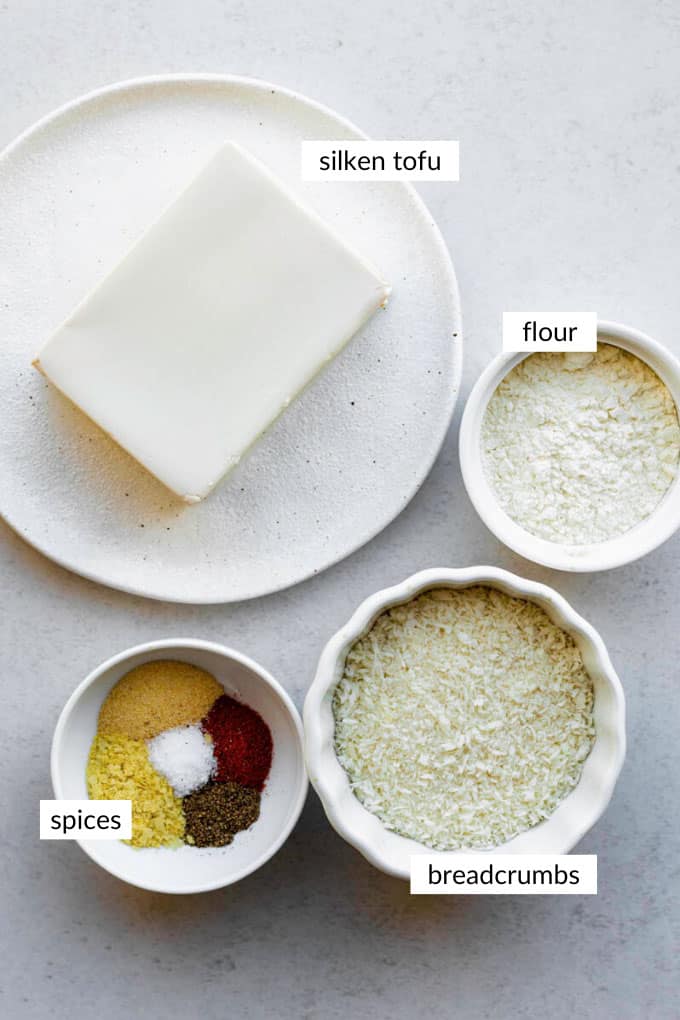 Gathered ingredients for making our fried silken tofu recipe with text overlay on each ingredient.