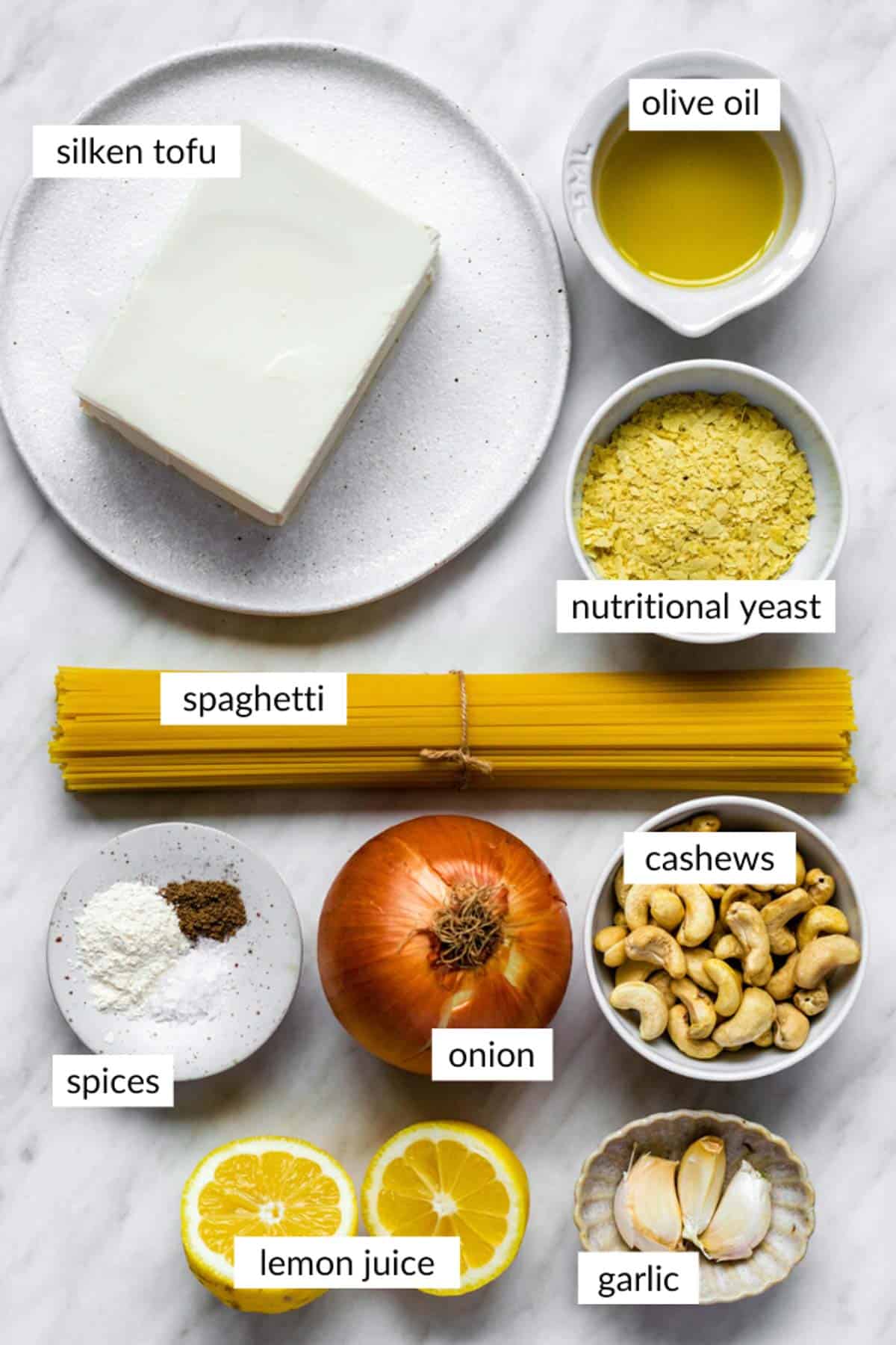 Ingredients needed for making silken tofu pasta sauce with text overlay on each ingredient.