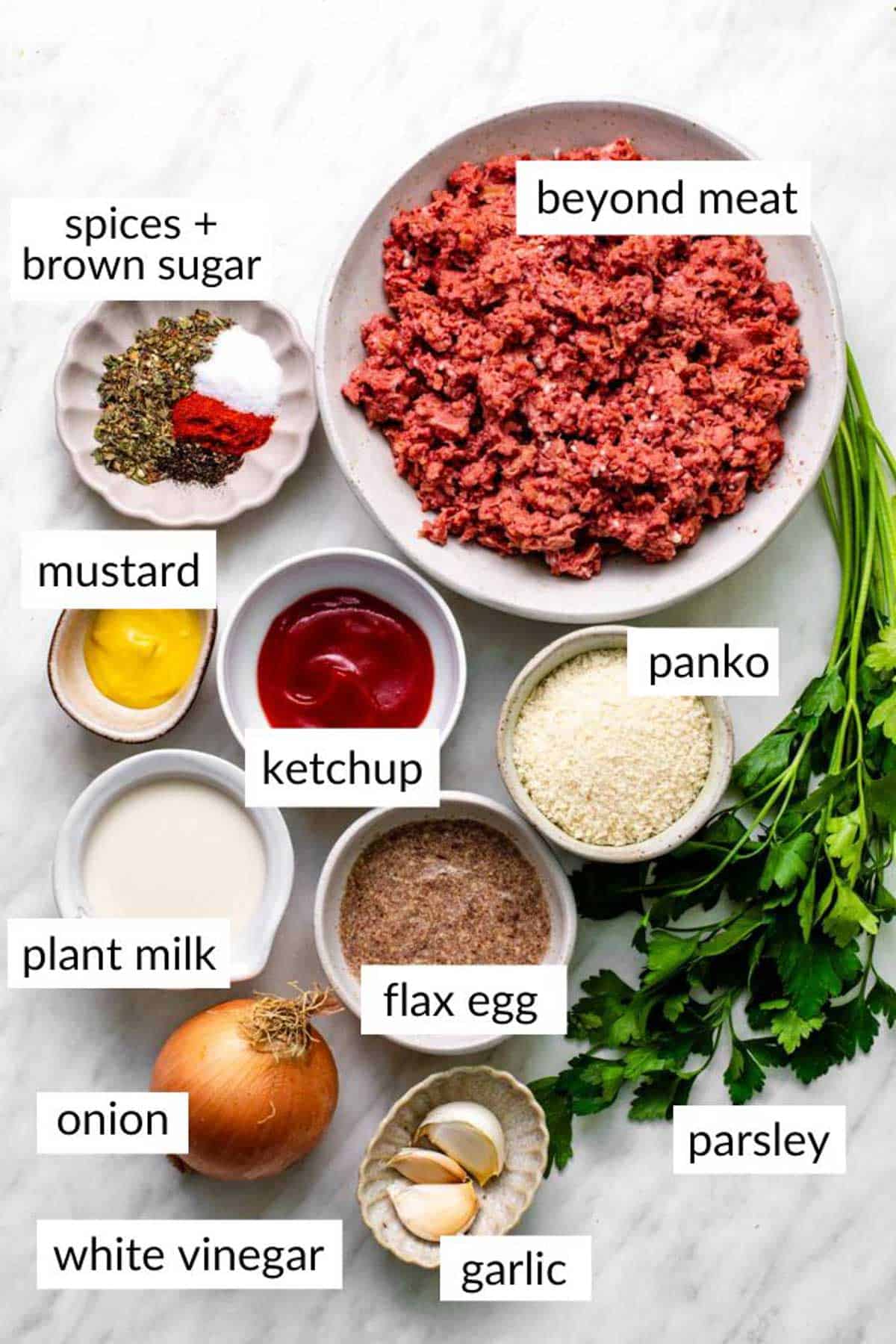 Gathered ingredients for making beyond meat mealoaf with text overlay on each ingredient.