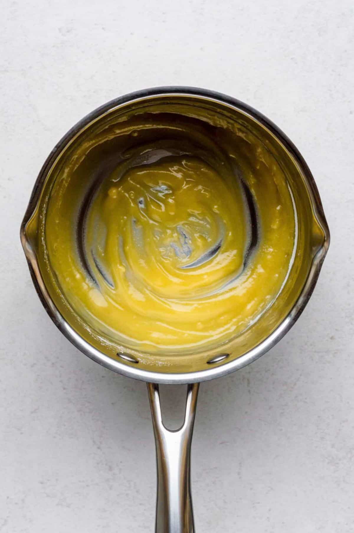Roux in a small stainless-steel saucepan.