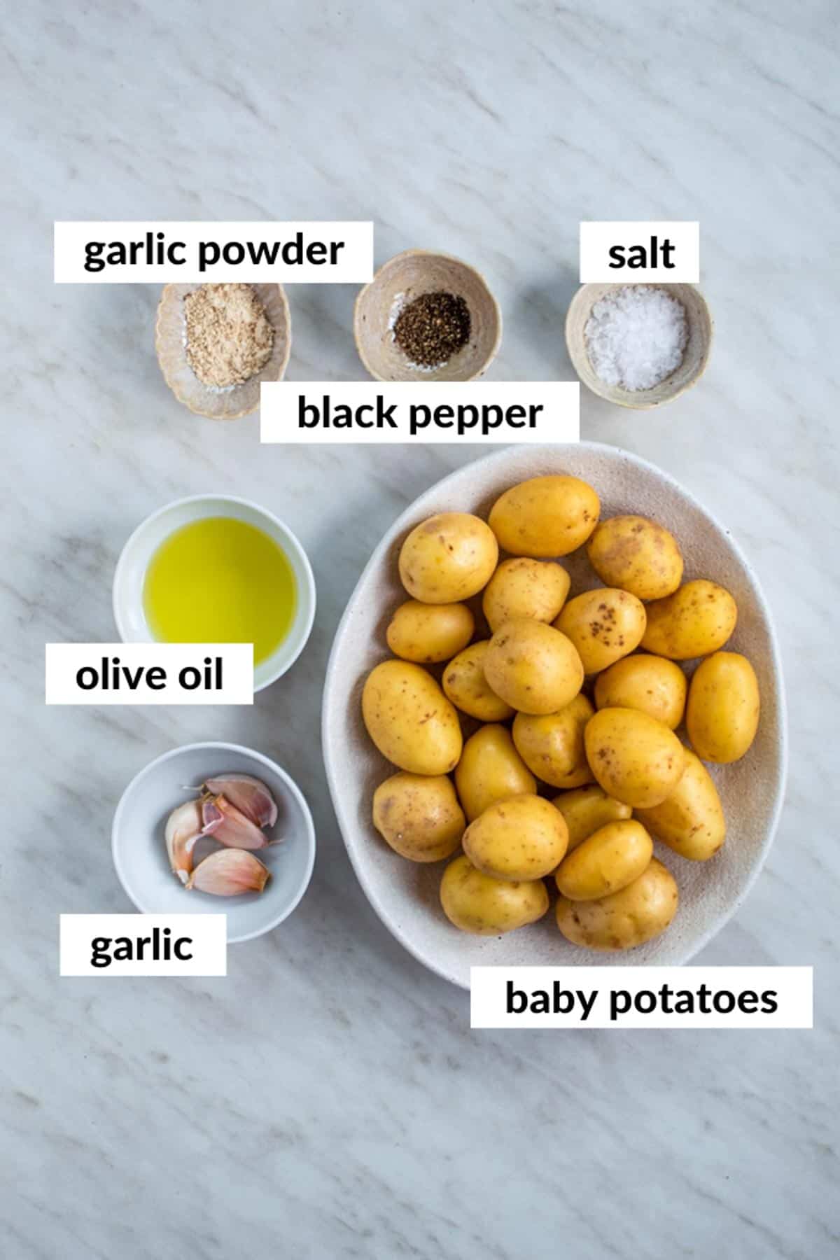 Gathered ingredients for making smashed potatoes with text overlay on each ingredient.