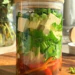 Instant noodle soup in a glass jar with a lid.
